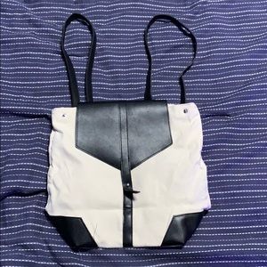 Never worn Black and cream Deux Lux back pack